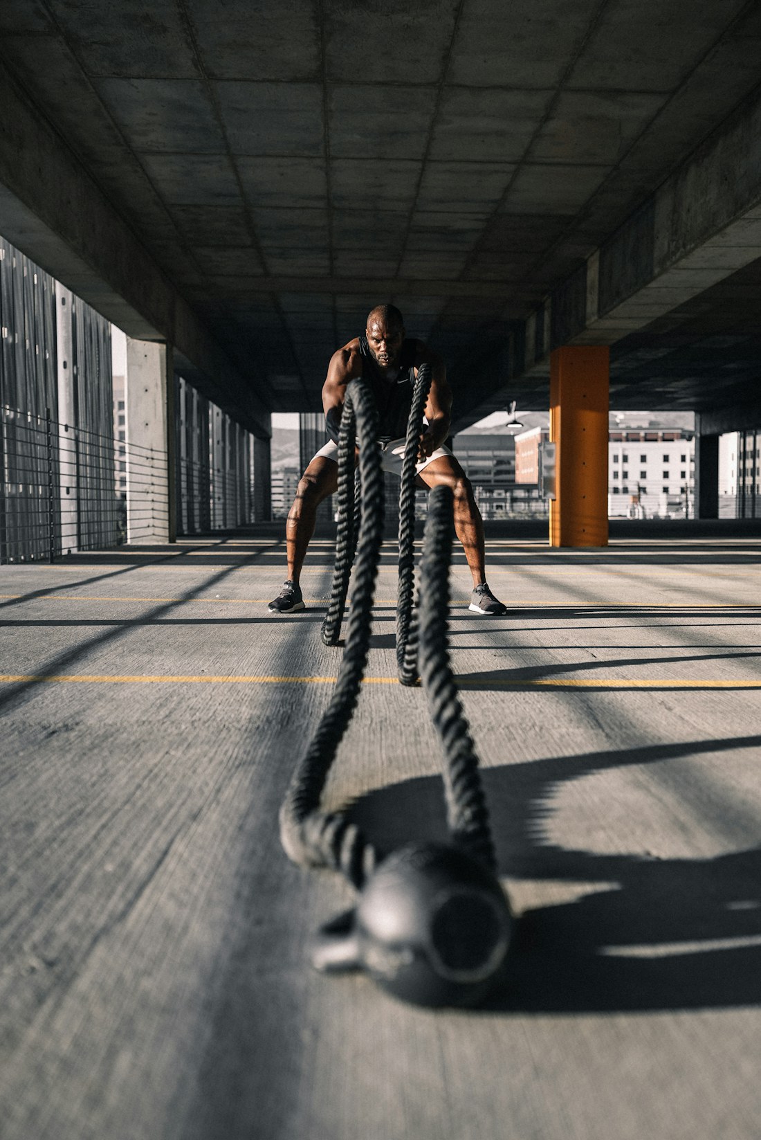 Athlete training with dumbbells